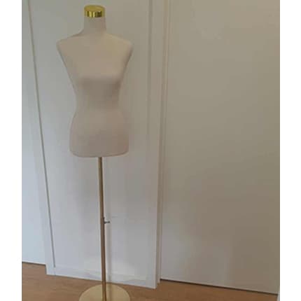 White and gold female mannequin