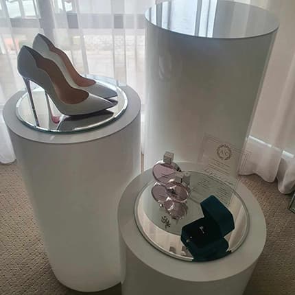 Round white acrylic plinth